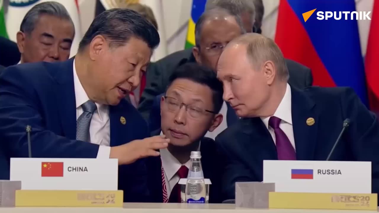 Putin and Xi Jinping are actively discussing something during the meeting of the XVI BRICS summit