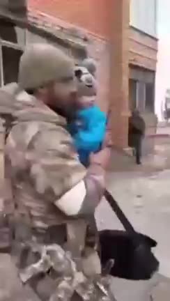 Chechen special forces help evacuate children with their families from liberated areas of Mariupol.