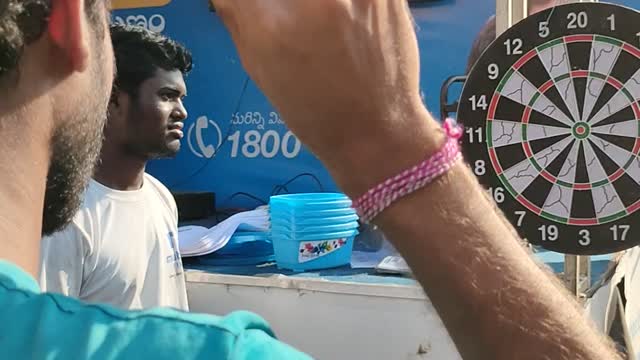 Playing Darts Game