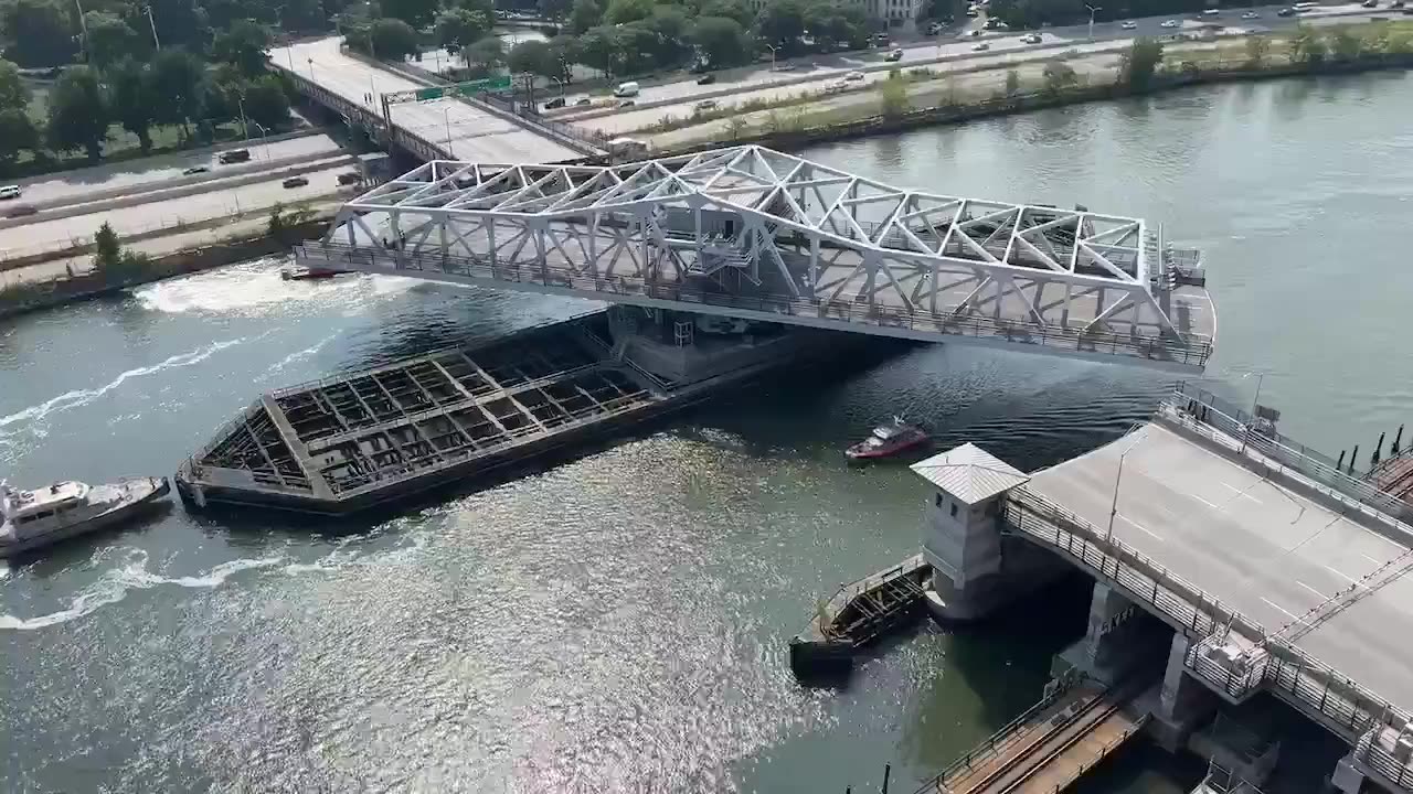 The 3rd Ave Bridge stuck is stuck in the "open" position due to overheating machinery.