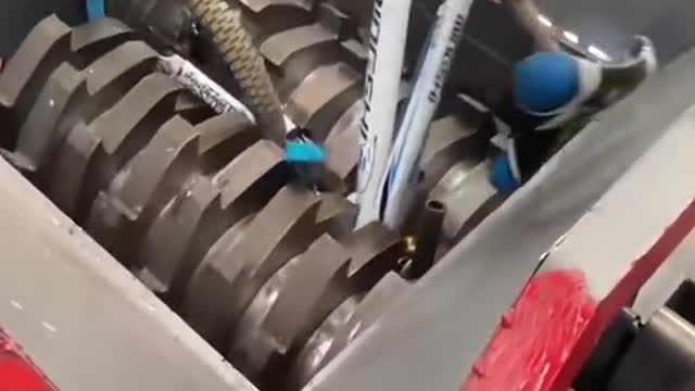 Bike crusher. Scrap metal shredder machine. Metal crusher. Cans crusher machine
