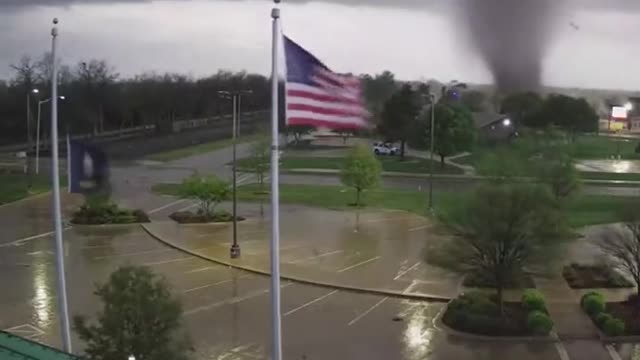 Security footage shared Wednesday shows a powerful tornado tearing through Andover