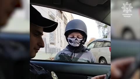 Ukraine: Somewhere near Kiev a child stands in a checkpoint
