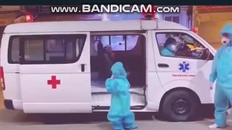 Vietnam - A five-year old child being taken to quarantine