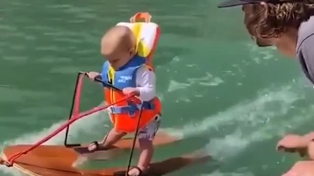 Brave boy cute loving waterskiing