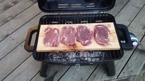 Steaks on cedar plank