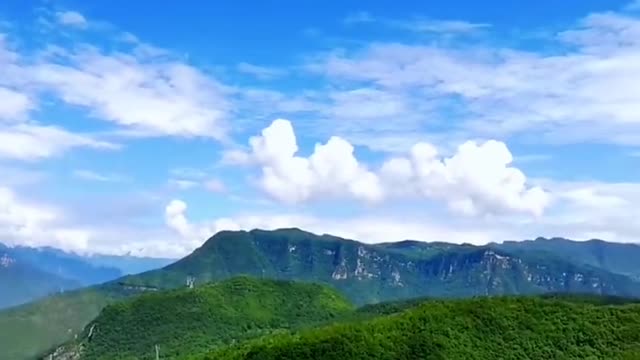 The high mountains, the blue sky