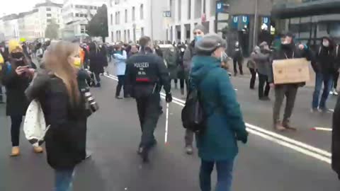 Police officers went around the demonstration to measure the distances