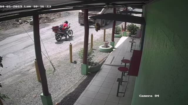 Truck Parks on Top of Unseen Motorcycle