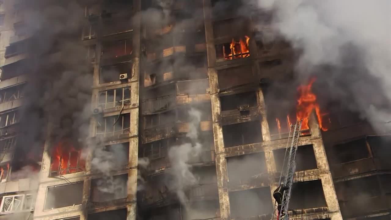 Flames engulf building in Kyiv after it was hit by Russian strike