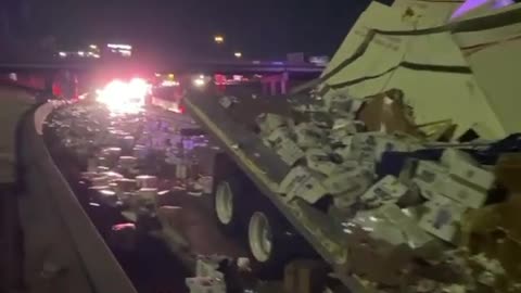 Dallas, Texas: 35,000 pounds of eggs spill all over I-30 at Malcolm X Boulevard early this morning.
