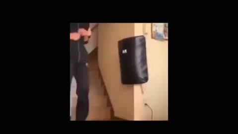 Funny video must watch man punch sand bag watch to see what happens