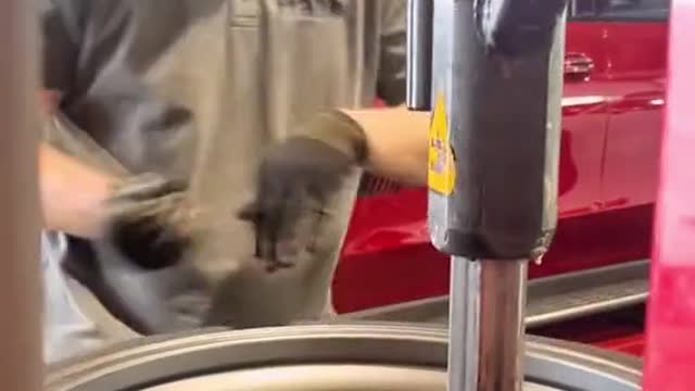 The mechanic expertly installed tires.