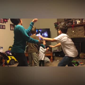 Trio Of Boys Try To Follow Dance Routine On TV