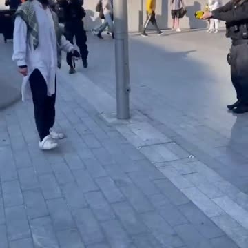 A man with a knife gets tasered outside Birmingham Train station.