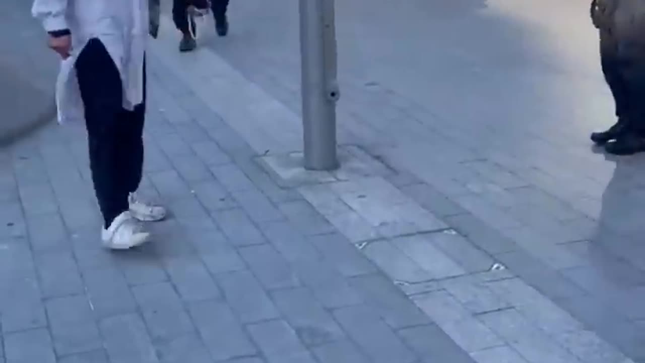 A man with a knife gets tasered outside Birmingham Train station.