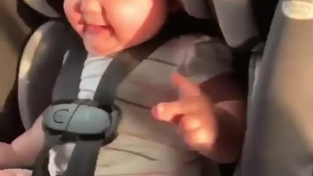 baby dancing and happy