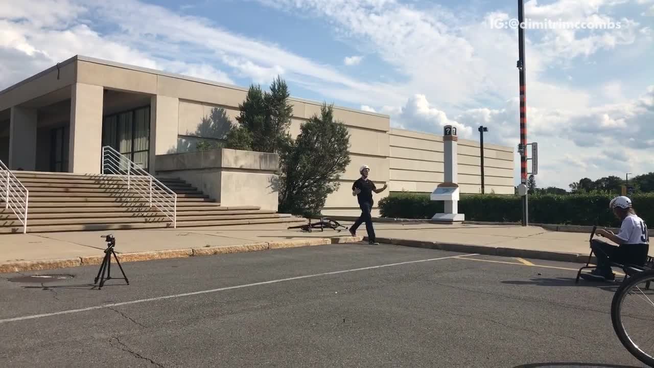 Guy jumps bike off stairs and breaks handle bars off