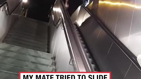 My mate tried to slide down the escalator 😂