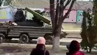 Ukraine Farmer tows away Russian tank