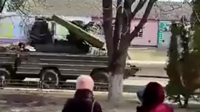 Ukraine Farmer tows away Russian tank