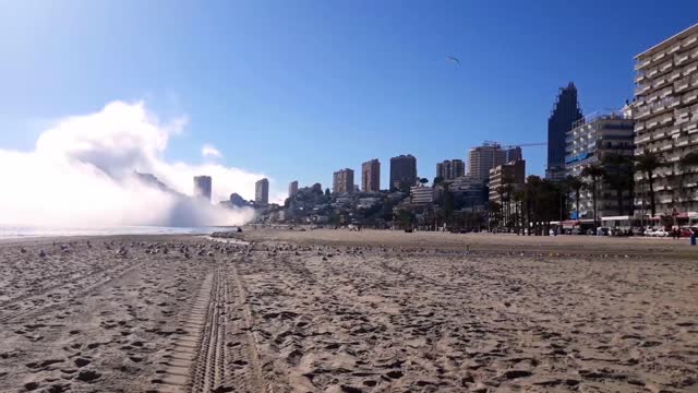 Time-Lapse of Cloud Bank Enveloping Beach