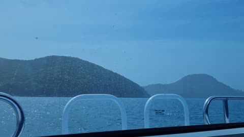 A beautiful ocean view on a cruise ship moving to the island.