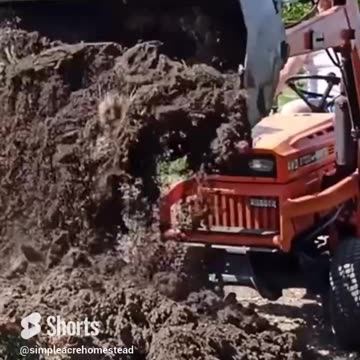 Snack time and watching Daddy on the Kubota tractor. #homesteading #familyfarm #kubota
