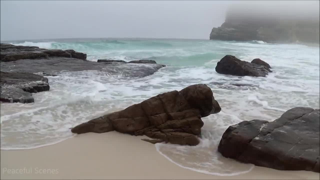 ocean waves - high quality sound - no music - HD video of a beautiful misty beach