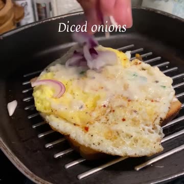 "Delectable Delights: Elevate Your Morning with a Cheesy Egg Sandwich Bliss!"