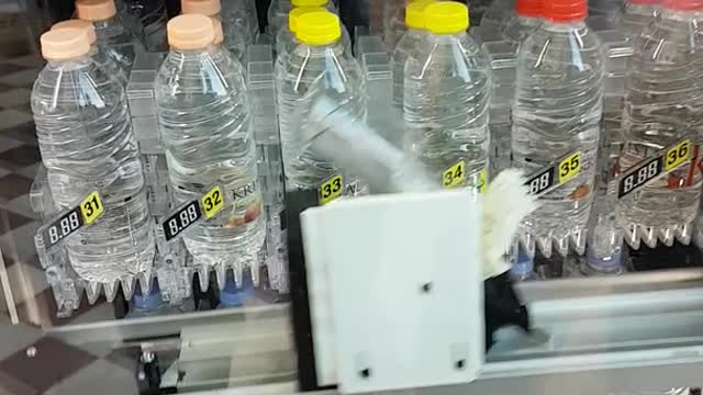 New robot coke machine doesn't drop bottle in slot