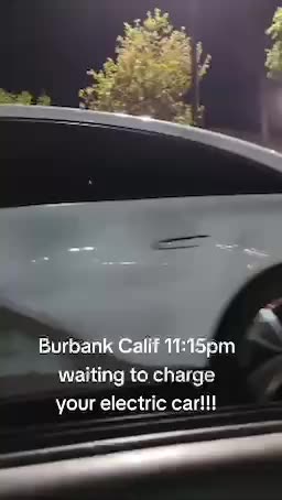 Charging an electric vehicle in Burbank at 11:15 pm.