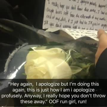 Zoom in of guy carrying flowers with big note on subway