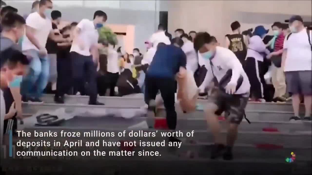 CHINA PROTESTERS BEATEN AND WHY FREEZE ON BANK DEPOSITS