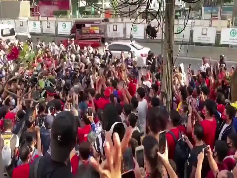 Thai police scuffle with protesters at demonstration against Myanmar coup.