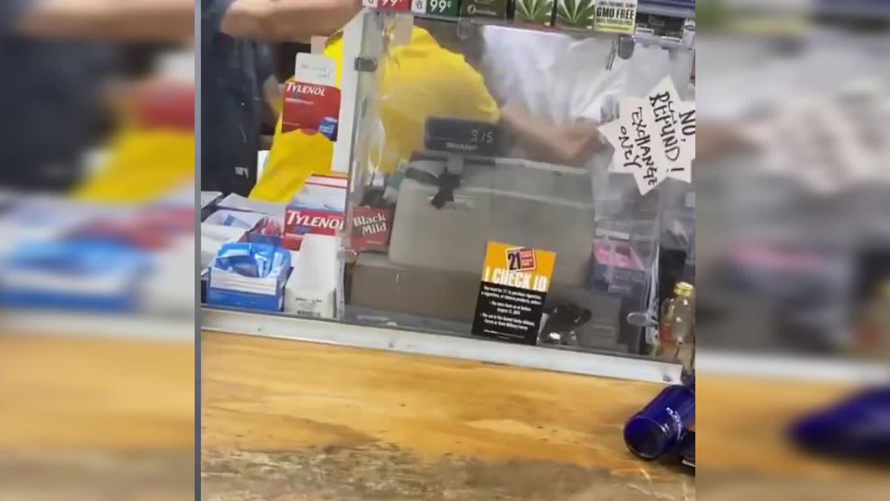 Asian shop keeper was armed with a gun, Second thug refuses to help his Friend