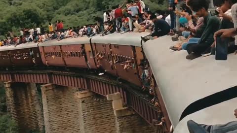 Traveling on top of train in India 😨