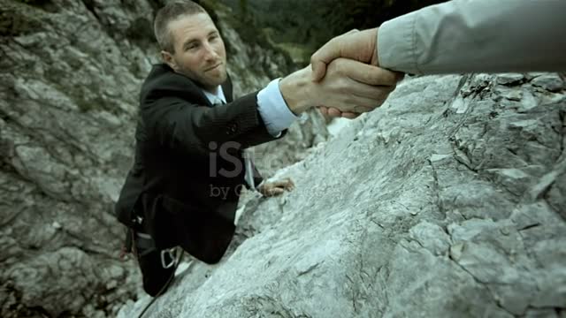 HD: Businessman Reaching For A Helping Hand stock video