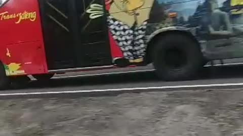 bus crossing the highway