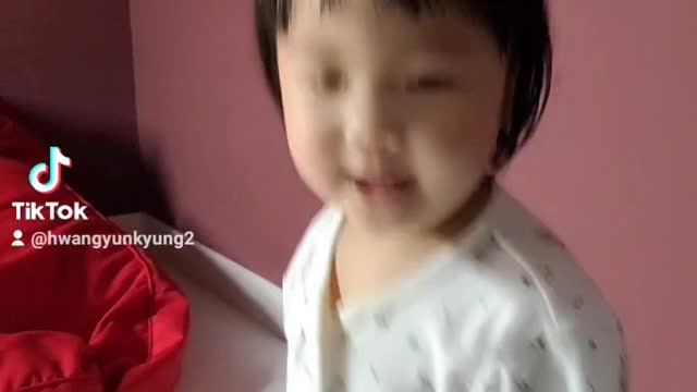 Baby dancing to the song 1