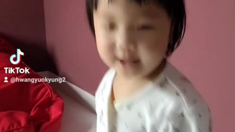 Baby dancing to the song 1