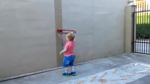 WATCH: 22 Month Old baby learn how to Play Basketball