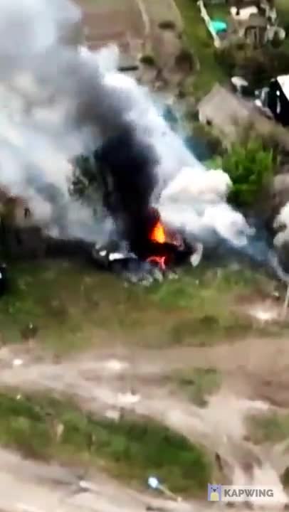 The Ukrainian 30th Mechanized Brigade hit a BTR-80 with a 2S1"Gvozdika"122mm self-propelled howitzer