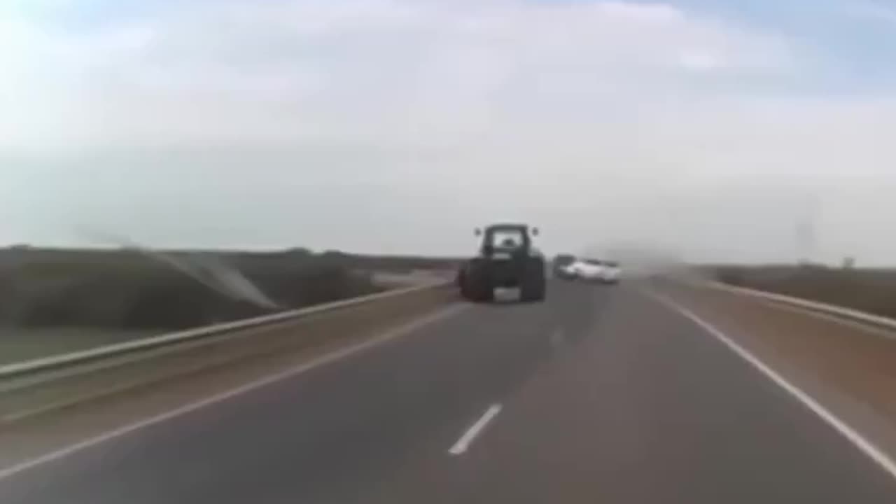 Car Crashes Into Tractor