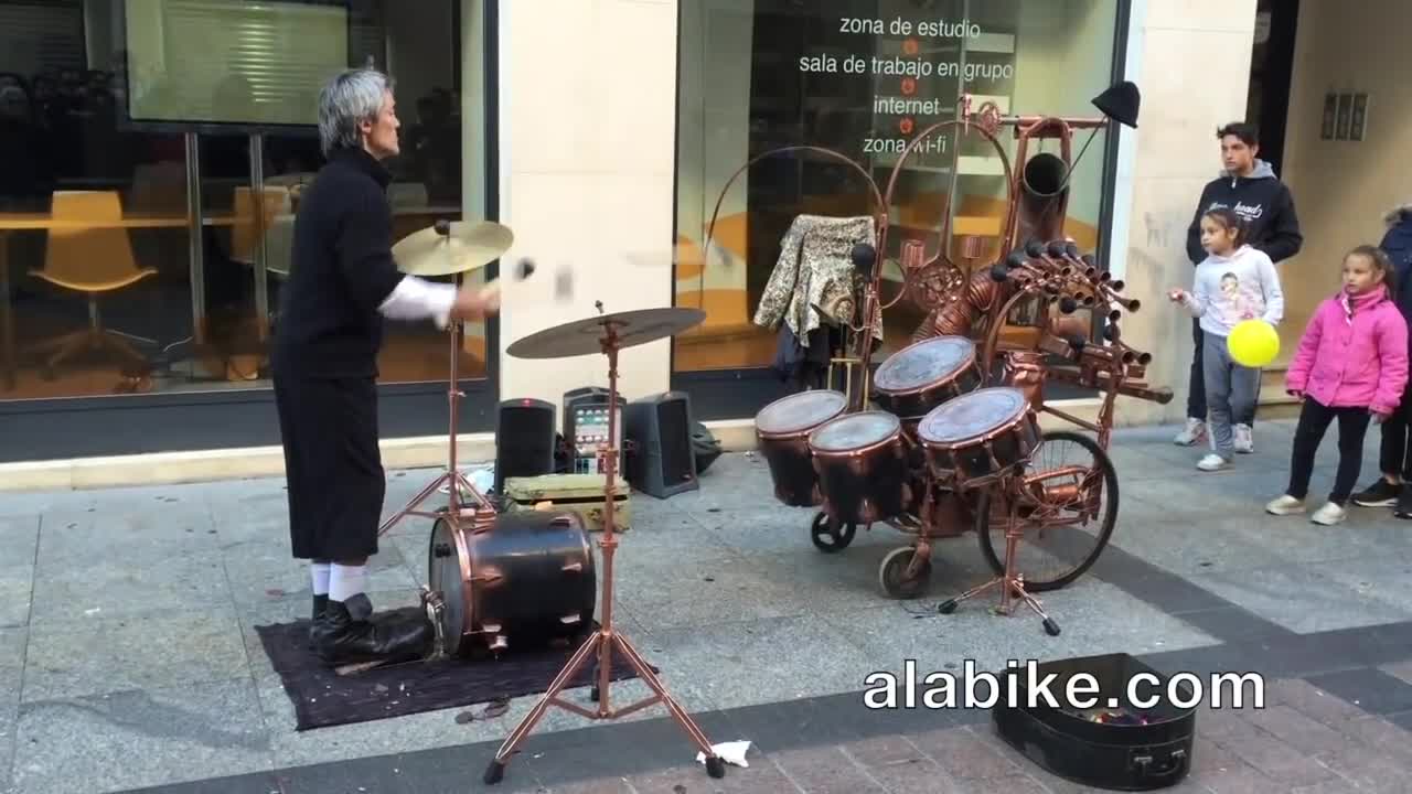 Drum Juggling Street Performer