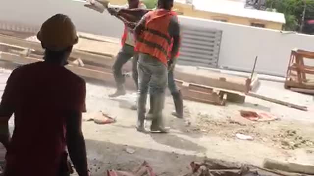 masons disagree and one hits the other with the shovel