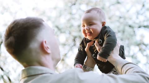 Father and child and mutual joy