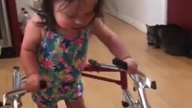 Toddler with Down's syndrome taking her VERY FIRST STEPS