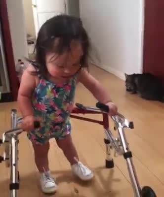Toddler with Down's syndrome taking her VERY FIRST STEPS