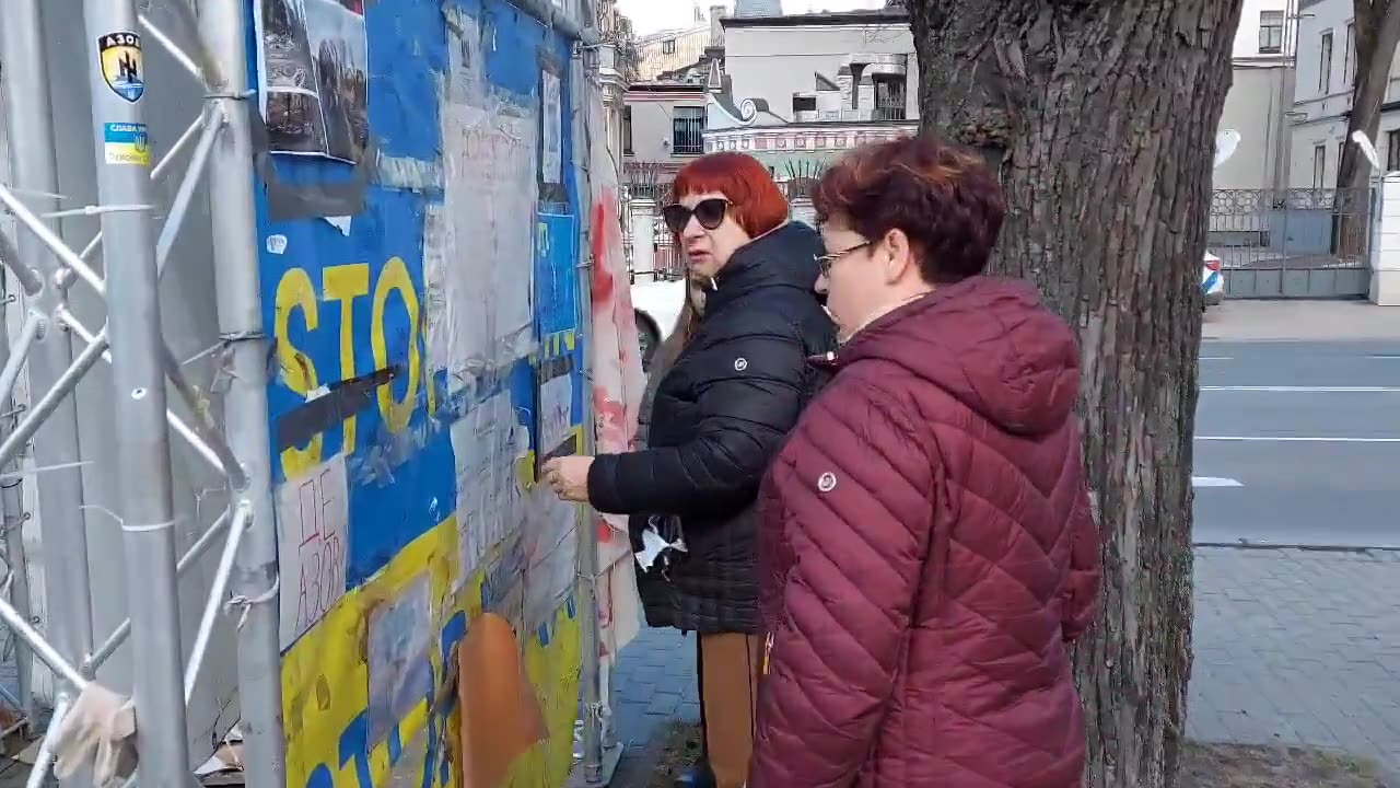 Signs supporting Zelensky taken off near... Russia's Embassy in Riga, Latvia